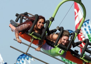Illustration for article titled Gallery: Snooki's Joyous Sunday In The (Amusement) Park